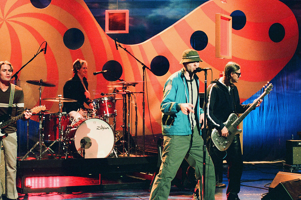 THE TONIGHT SHOW WITH JAY LENO -- Episode 1538 -- Pictured: (l-r) Bradley Fernquist, Josh Freese, Gregg Alexander, Sasha Krivtsov of musicial guest The New Radicals perform on February 3, 1999 -- (Photo by: Joey Del Valle/NBCU Photo Bank/NBCUniversal via Getty Images via Getty Images)